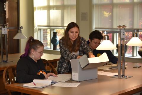 CWC student staff in the Library archives