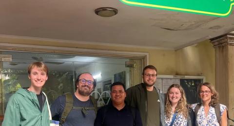 group of people standing together outside