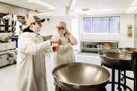 two people in the manufacturing kitchen
