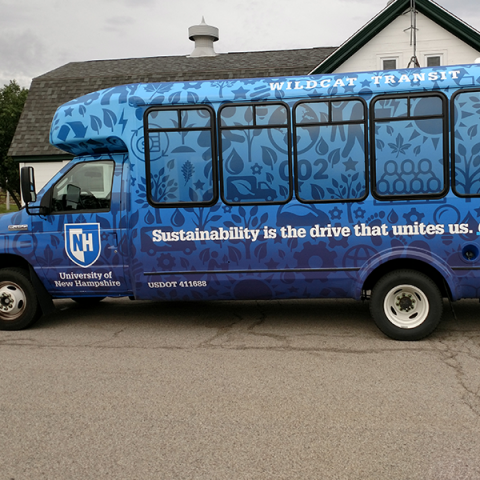bus wrapped in sustainability icons