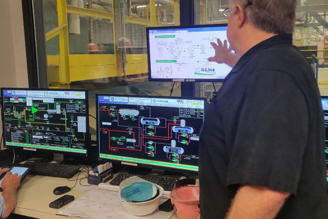 person inside the cogen plant at computers