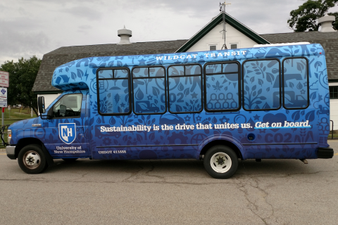 bus wrapped in sustainability icons