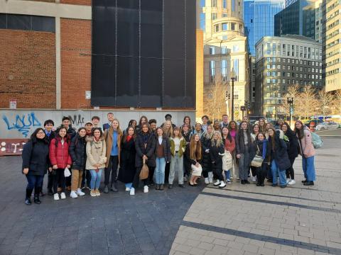 group of people standing together outside