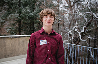 a student standing outside