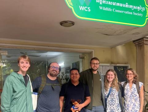 group of people standing together outside