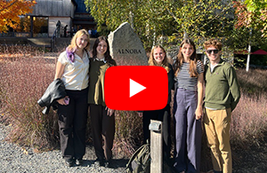 small group of people standing outside