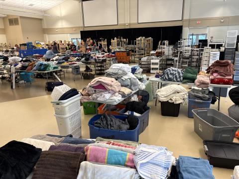 large room with items set up on tables