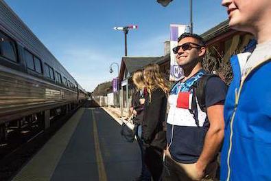 students at Downeaster Durham train station
