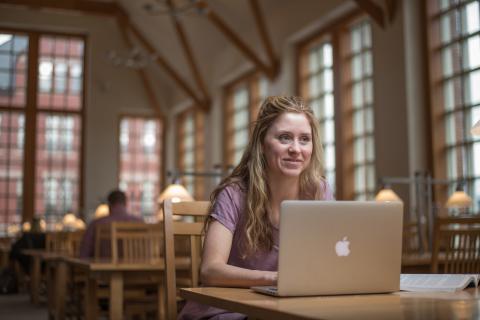 Student on their laptop in the library