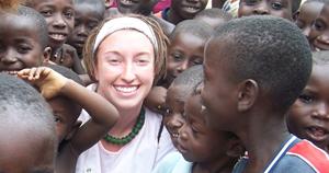 Ashley Barbour with children in Ghana