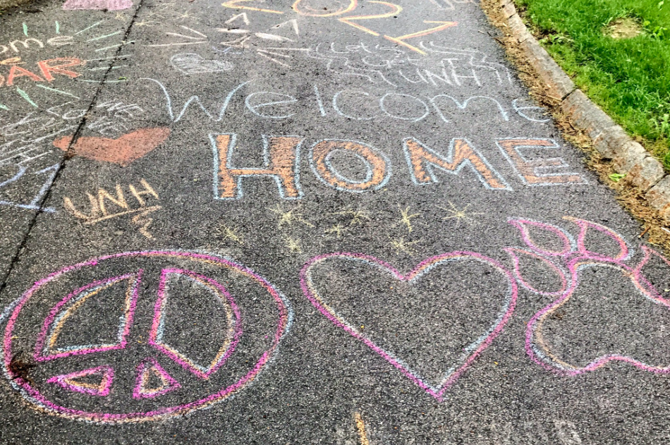 Chalk text on sidewalk