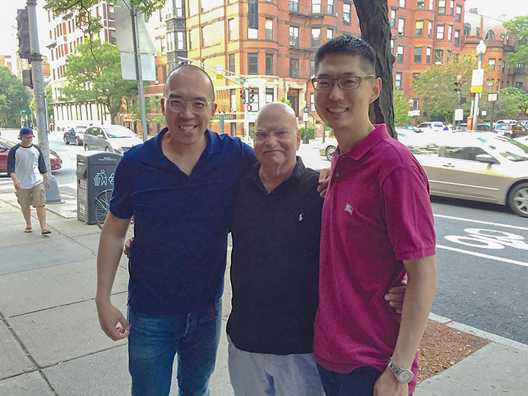 from left: Kevin Yeung ’96, UNH political science professor John Kayser and Michael Lim ’95.