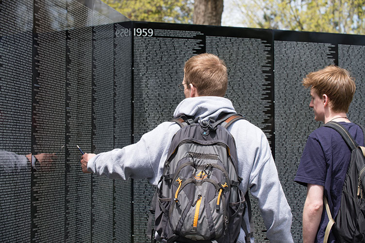 UNH Students paid their respects at The Moving Wall, a mobile, half-sized replica of the Vietnam Veterans Memorial Wall