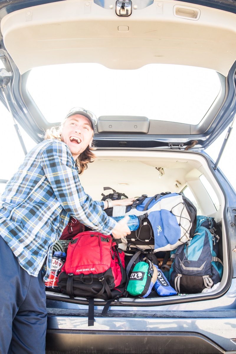 UNH student preparing for an outdoor adventure