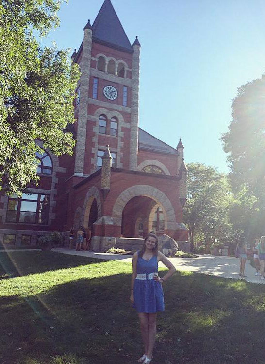 UNH student Hailey Simpson ’19 in front of Thompson Hall