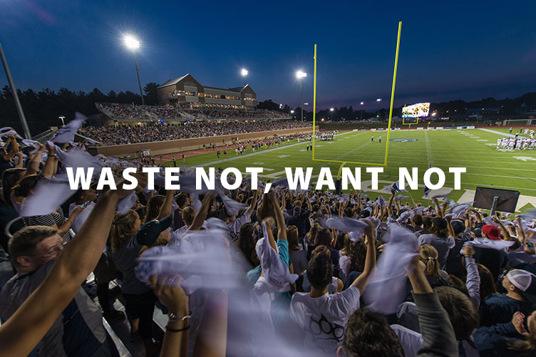 fans cheering during a UNH football game at Wildcat Stadium