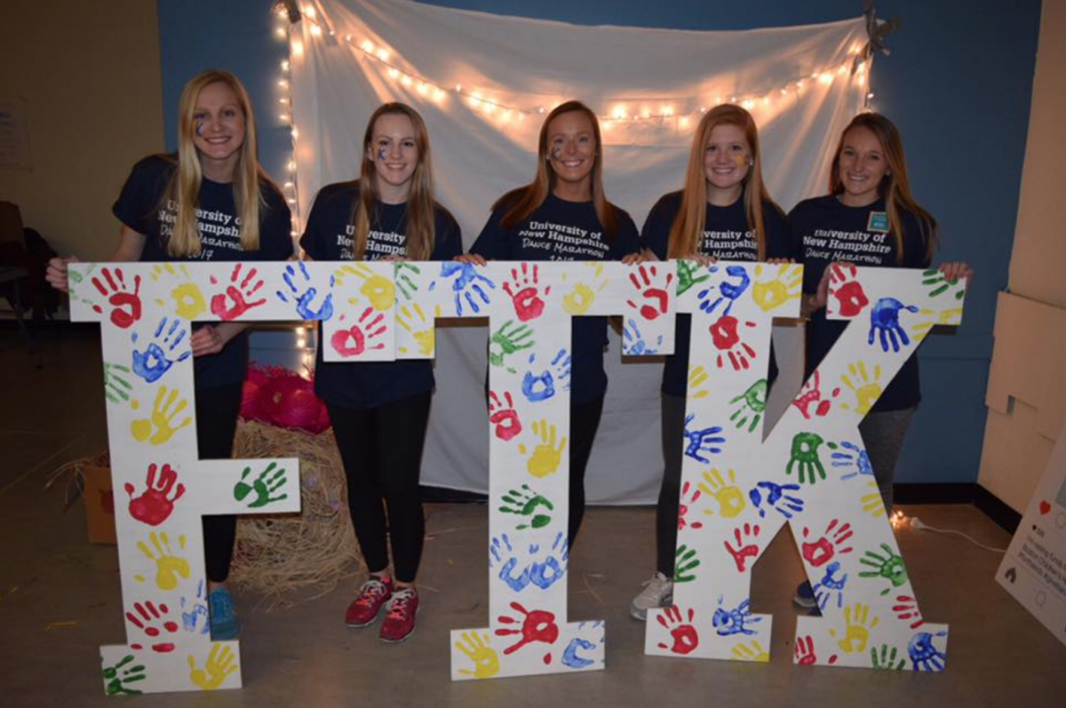 Wildcats at Dance Marathon behind For The Kids letters