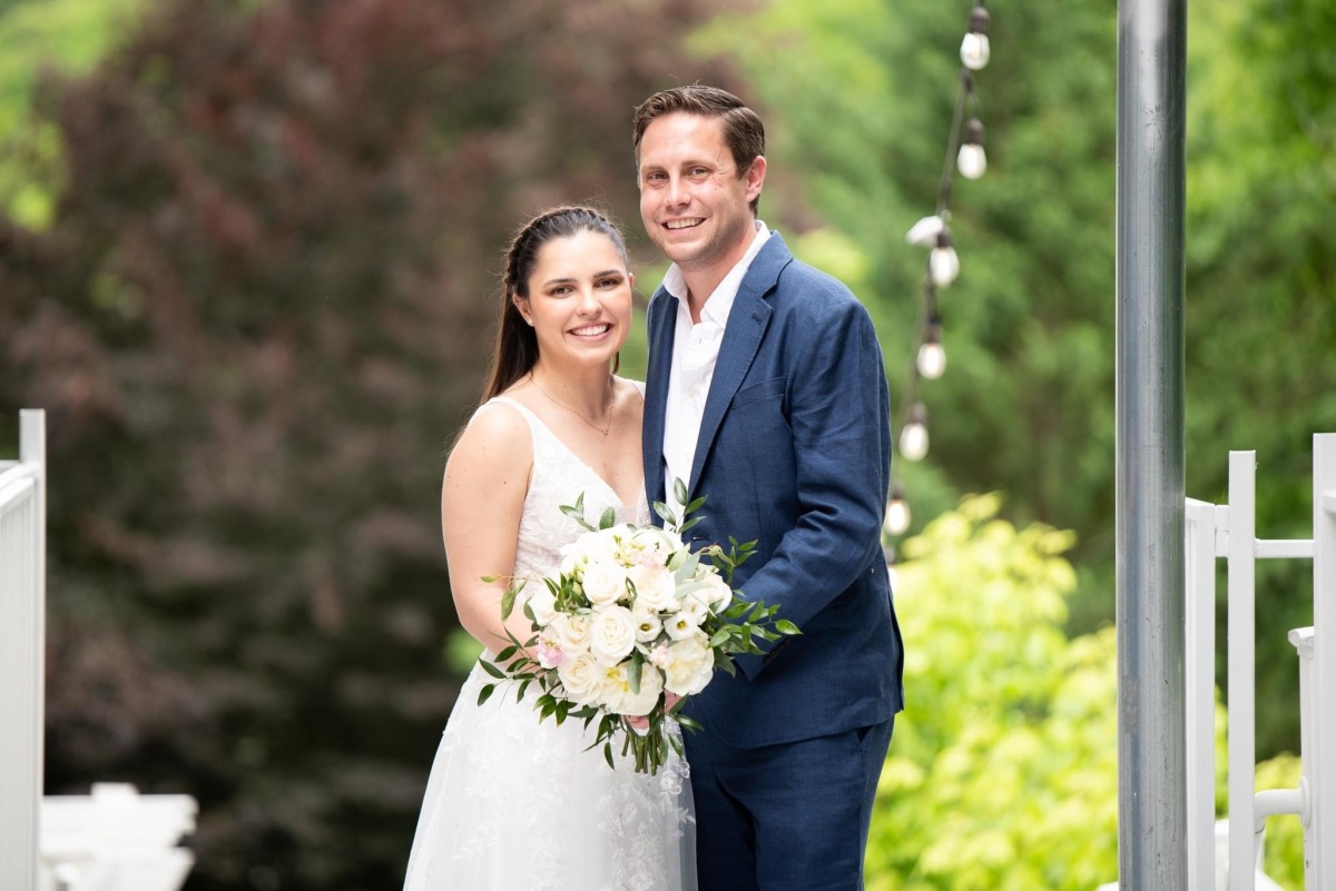 Adam Brockett and his wife Gaby on their wedding day
