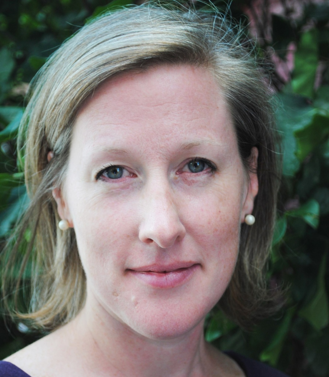 Headshot of woman with short blonde hair
