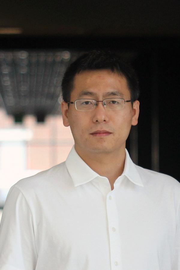 UNH researcher Dialiang Chen, a male, looks at the camera wearing a white shirt.