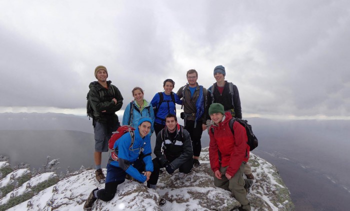 Students in the UNH Outing Club pre-orientation program on top of a mountain