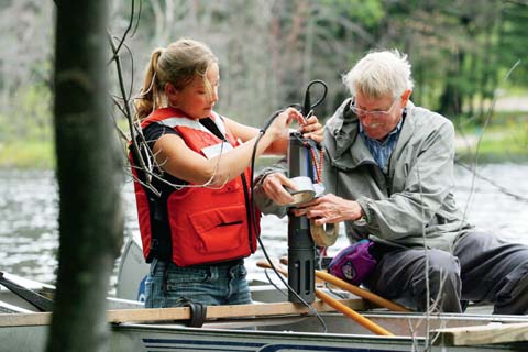 Haney with student in boat