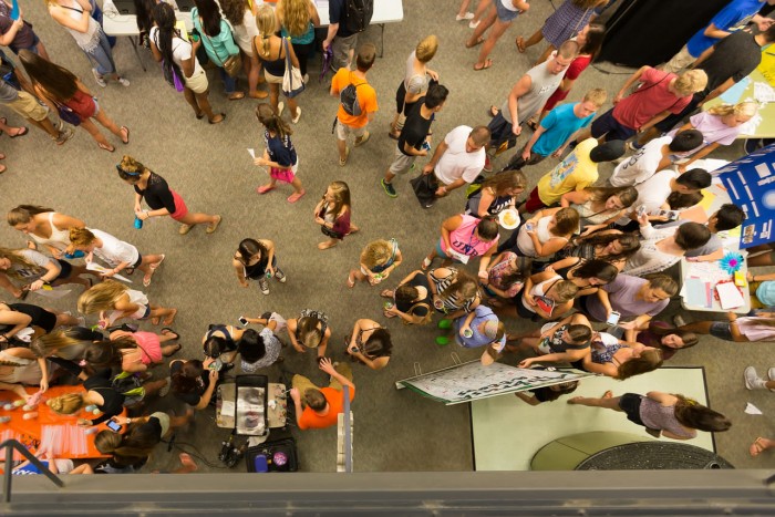 overhead view of UNH students walking around a fair