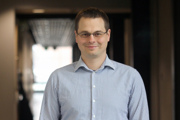 Portrait of white man wearing glasses