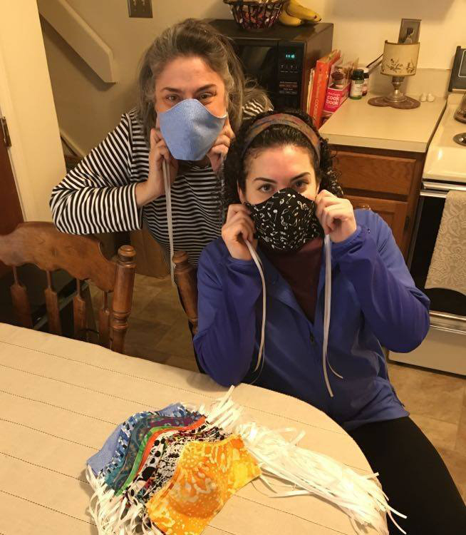 Deb Howard and Laura Howard displaying face masks