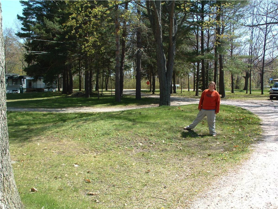 Archaeologist Meghan Howey stands on a burial mound in Michigan