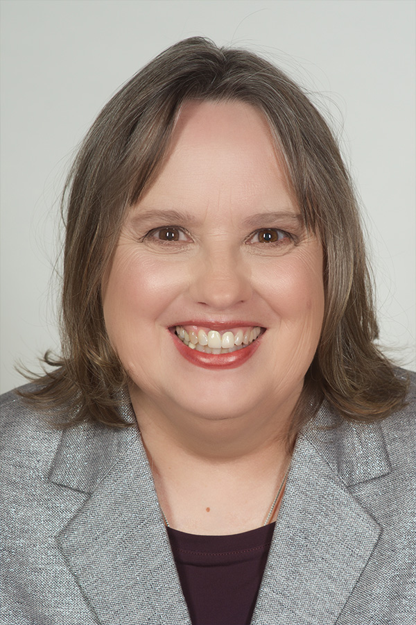 A headshot of UNH dairy researcher Nancy Whitehouse