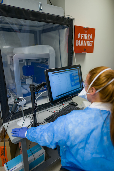 Student looking at COVID test results on computer