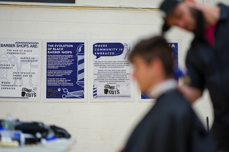 Educational signage during the barbershop event