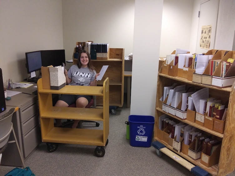 Molly Gearhart in the library offices