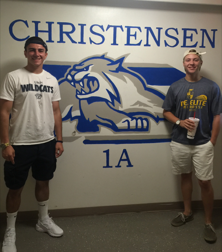 Vinnie LoBuono '20 with a friend in Christensen Hall