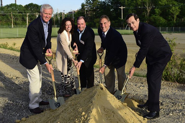 People with shovels at ground breaking