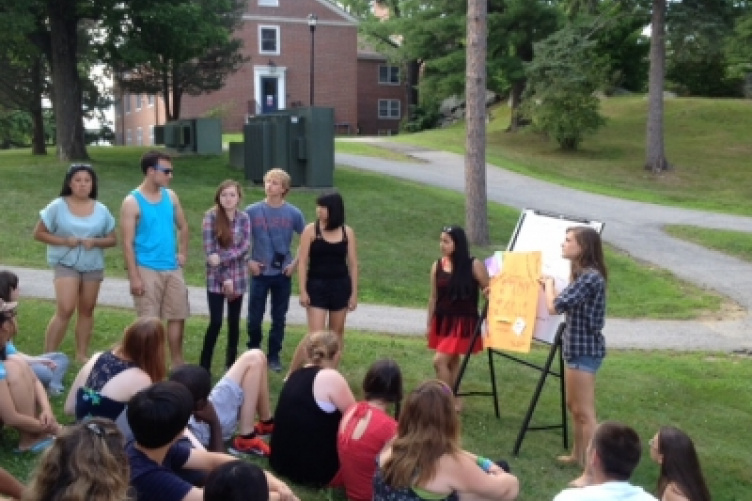 upward bound students giving an outdoor presentation