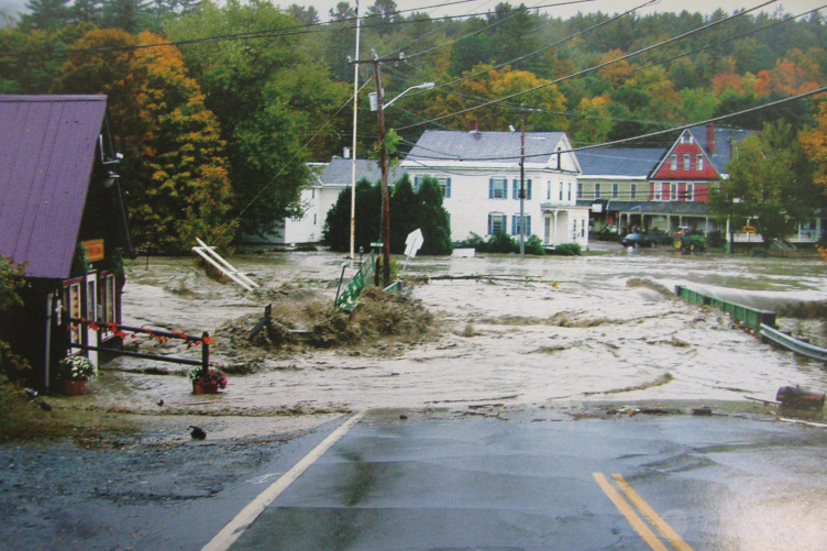 A flood devastated Alstead, N.H. in October 2005. Flooded road in New Hampshire town