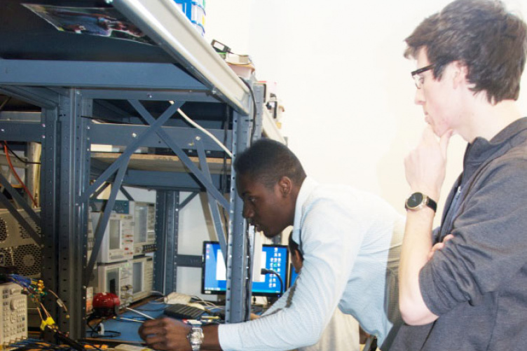 Two UNH students who met while interns at the IOL in high school