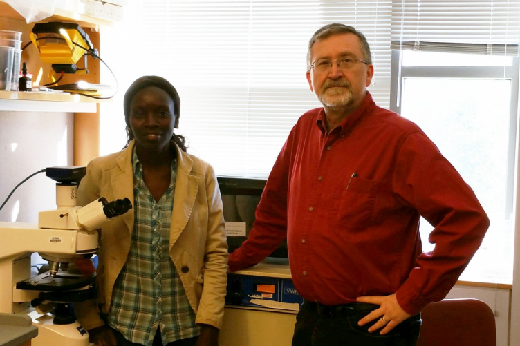 Nathalie Diagne of Senegal  and Louis S. Tisa, a researcher with the NH Agricultural Experiment Station 