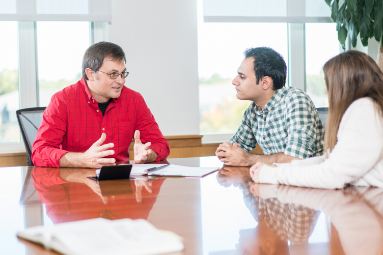 UNH professor Robert Mohr with students