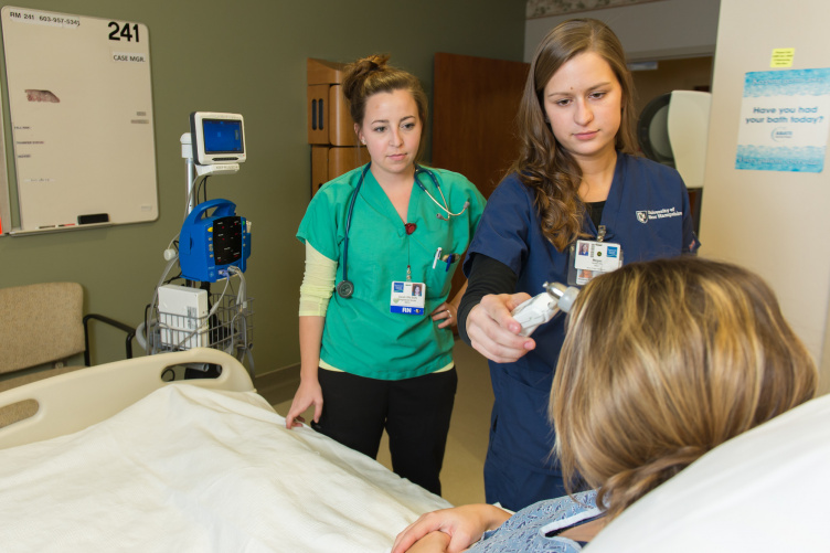 UNH nursing student with mentor at Portsmouth Regional Hospital