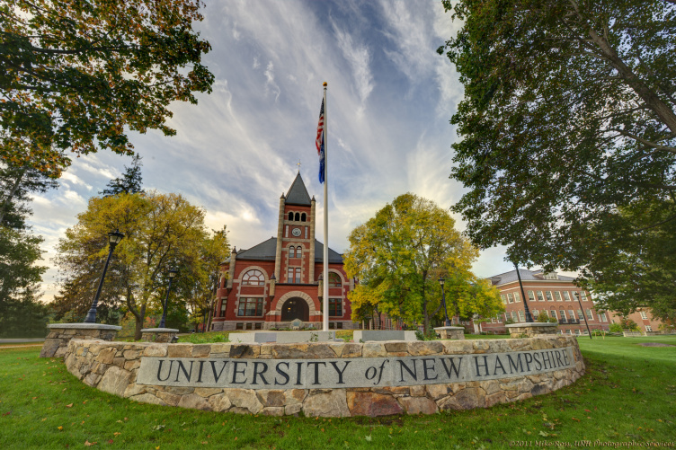 T Hall behind the UNH sign