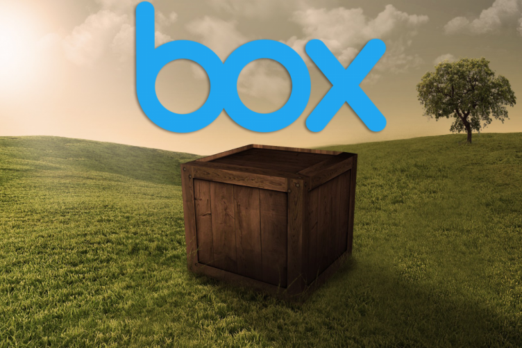 wooden box in the middle of a field
