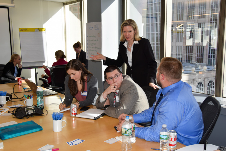 Brodeur Partners UNH students working together with Dean Bostic.