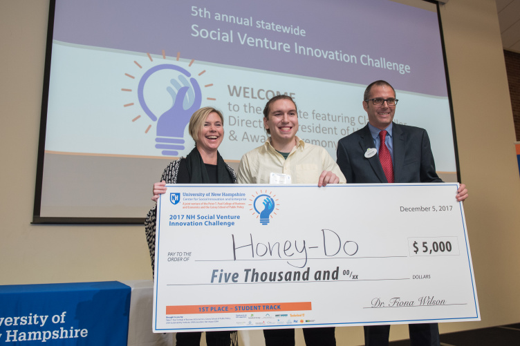 First-place student winner track Andrew DeMeo, '18 (center)