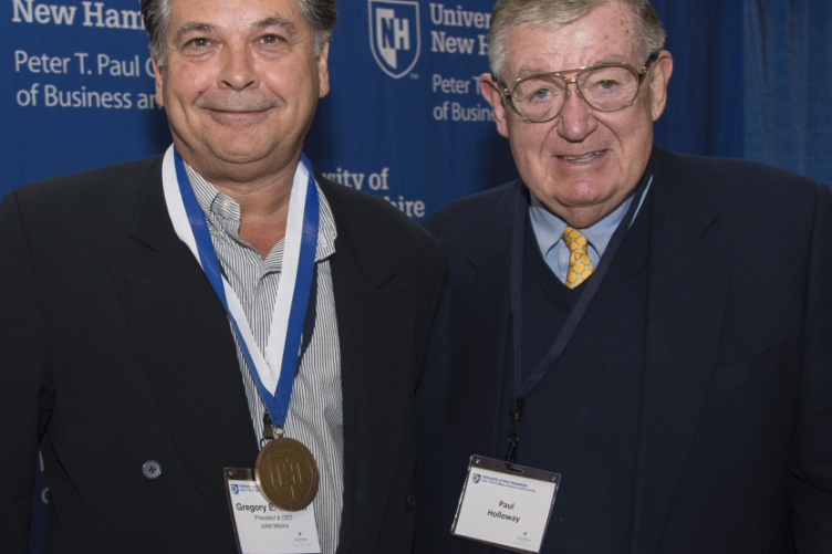 Gregory Sancoff, left, poses with Paul Holloway during the 2016 Paul J. Holloway Prize Competition championship round. Gregory Sancoff, left, poses with Paul Holloway during the 2016 Paul J. Holloway Prize Competition championship round.