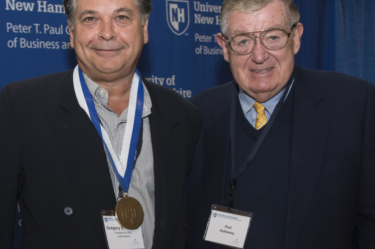 Gregory Sancoff, left, poses with Paul Holloway during the 2016 Paul J. Holloway Prize Competition championship round. 