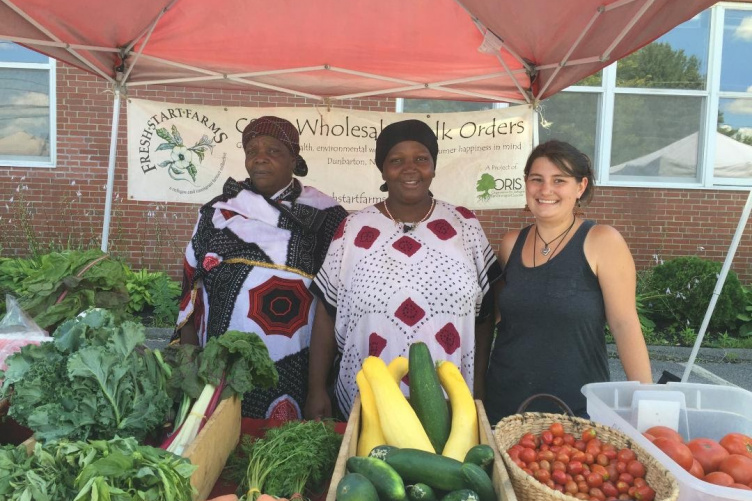 Image of Higgins at a farmer's market