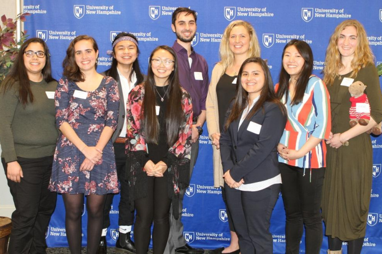 A group of students post for a photo at the CYOS luncheon